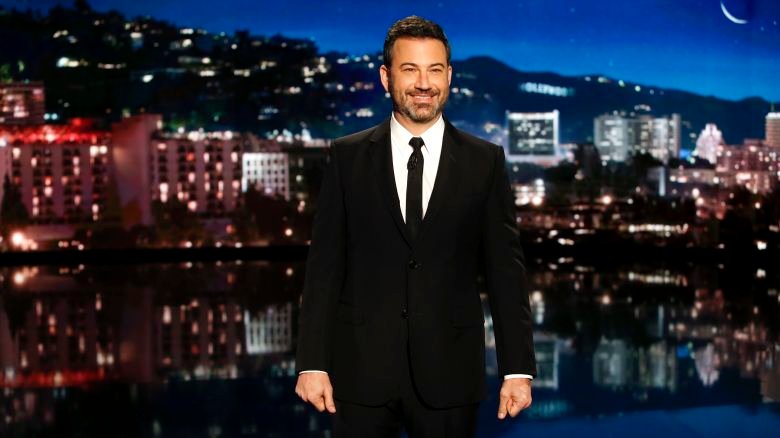 JIMMY KIMMEL LIVE! - "Jimmy Kimmel Live!" airs every weeknight at 11:35 p.m. EDT and features a diverse lineup of guests that include celebrities, athletes, musical acts, comedians and human interest subjects, along with comedy bits and a house band. The guests for Thursday, October 11 included Dakota Johnson ("Suspiria" and "Bad Times at the El Royale"), Ike Barinholtz ("The Oath"), and musical guest Tom Morello with Portugal. The Man and Whethan. (Randy Holmes via Getty Images)
                                                                                    JIMMY KIMMEL