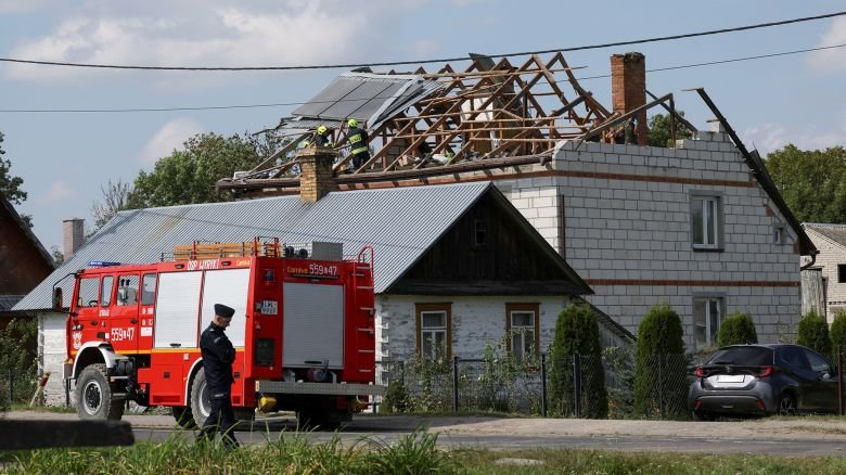 Firefighters at work hours after Russian drones violated Polish airspace during an attack on Ukraine, in Wyryki-Wola, Lublin Voivodeship, Poland.